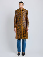 Proenza Schouler Front full length image of model wearing Leticia Coat in Python Print in Gold Multi