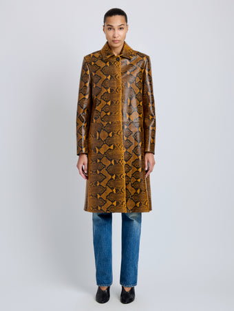 Proenza Schouler Front full length image of model wearing Leticia Coat in Python Print in Gold Multi