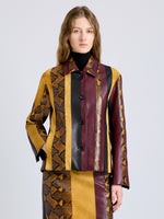 Proenza Schouler Front cropped image of model wearing Sirine Jacket in Pieced Leather in Gold Multi