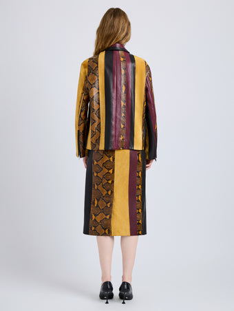 Proenza Schouler Back full length image of model wearing Sirine Jacket in Pieced Leather in Gold Multi
