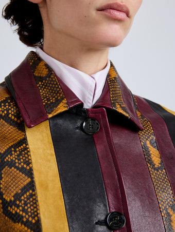 Proenza Schouler Detail image of model wearing Sirine Jacket in Pieced Leather in Gold Multi