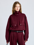 Proenza Schouler Front cropped image of model wearing Aviva Jacket in Wool Gabardine in Oxblood