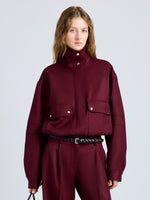 Proenza Schouler Front cropped image of model wearing Aviva Jacket in Wool Gabardine in Oxblood