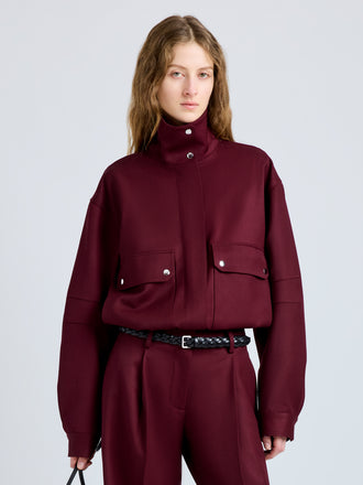 Proenza Schouler Front cropped image of model wearing Aviva Jacket in Wool Gabardine in Oxblood