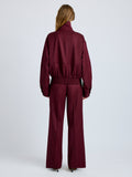 Proenza Schouler Back full length image of model wearing Aviva Jacket in Wool Gabardine in Oxblood