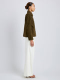 Proenza Schouler Side full length image of model wearing Irine Suede Jacket in Cypress