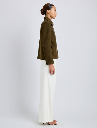 Proenza Schouler Side full length image of model wearing Irine Suede Jacket in Cypress