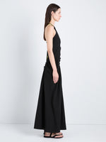 Proenza Schouler Side full length image of model wearing Sirena Dress in Crinkle Linen Viscose in Black