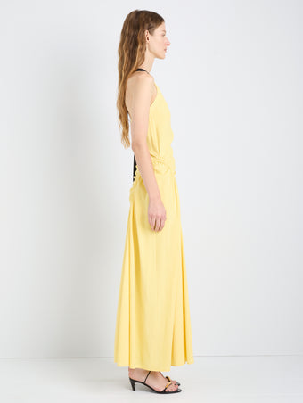 Proenza Schouler Side full length image of model wearing Sirena Dress in Crinkle Linen Viscose in Yellow