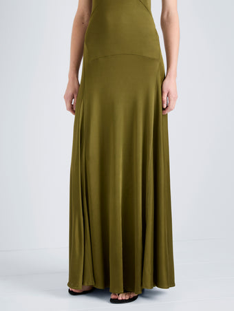 Proenza Schouler Detail image of model wearing Naia Dress in Viscose Satin Jersey in Moss