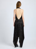Proenza Schouler Back full length image of model wearing Paulina Dress in Pleated Georgette in Black Multi