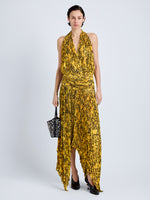 Proenza Schouler Front full length image of model wearing Paulina Dress in Pleated Georgette in Gold Multi