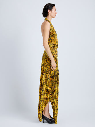 Proenza Schouler Side full length image of model wearing Paulina Dress in Pleated Georgette in Gold Multi