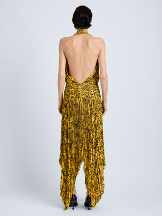 Proenza Schouler Back full length image of model wearing Paulina Dress in Pleated Georgette in Gold Multi