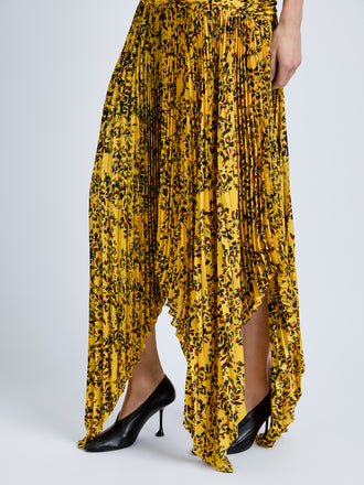 Proenza Schouler Detail image of model wearing Paulina Dress in Pleated Georgette in Gold Multi
