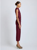 Proenza Schouler Side full length image of model wearing Katia Dress in Wool Gabardine in Oxblood