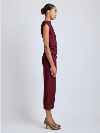 Proenza Schouler Side full length image of model wearing Katia Dress in Wool Gabardine in Oxblood