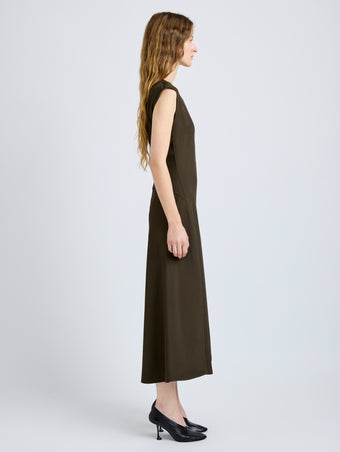 Proenza Schouler Side full length image of model wearing Eduarda Dress in Eco Hammered Viscose in Cypress