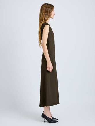 Proenza Schouler Side full length image of model wearing Eduarda Dress in Eco Hammered Viscose in Cypress