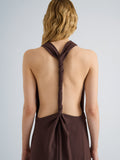 Proenza Schouler Detail image of model wearing Selena Dress in Matte Double Crepe in Dark Brown