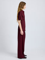 Proenza Schouler Side full length image of model wearing Nali Top in Wool Gabardine in Oxblood