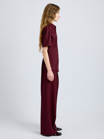 Proenza Schouler Side full length image of model wearing Nali Top in Wool Gabardine in Oxblood