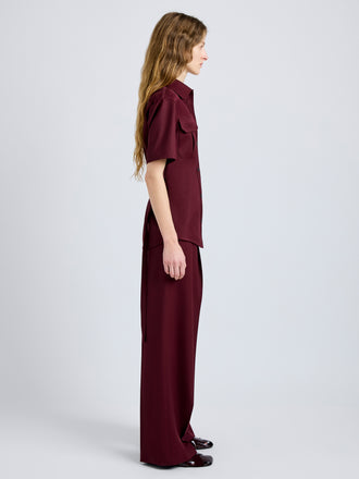 Proenza Schouler Side full length image of model wearing Nali Top in Wool Gabardine in Oxblood