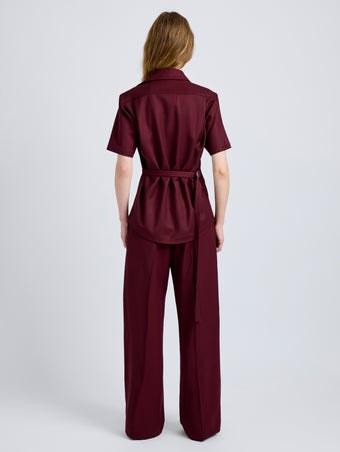 Proenza Schouler Back full length image of model wearing Nali Top in Wool Gabardine in Oxblood