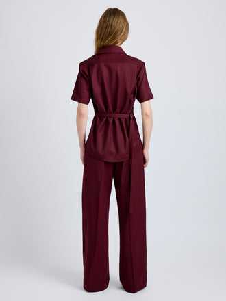 Proenza Schouler Back full length image of model wearing Nali Top in Wool Gabardine in Oxblood