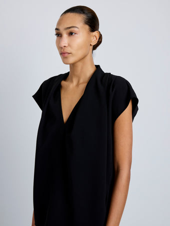 Proenza Schouler Detail image of model wearing Ranli Top in Matte Double Crepe in Black