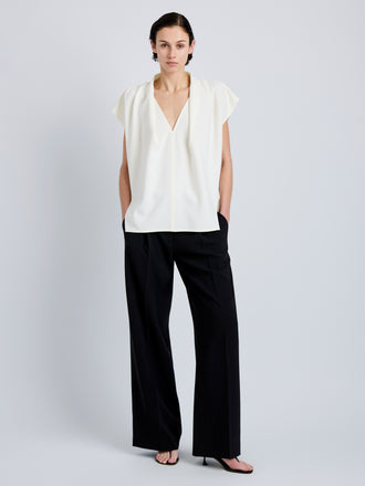 Proenza Schouler Front full length image of model wearing Ranli Top in Matte Double Crepe in Alabaster