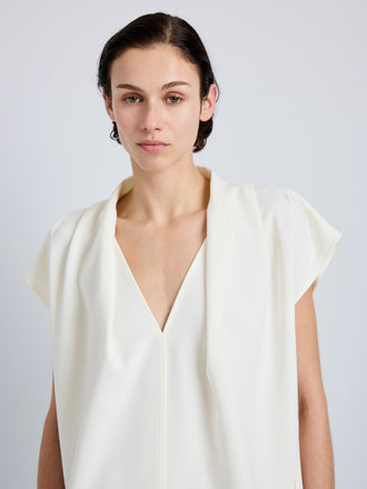 Proenza Schouler Detail image of model wearing Ranli Top in Matte Double Crepe in Alabaster