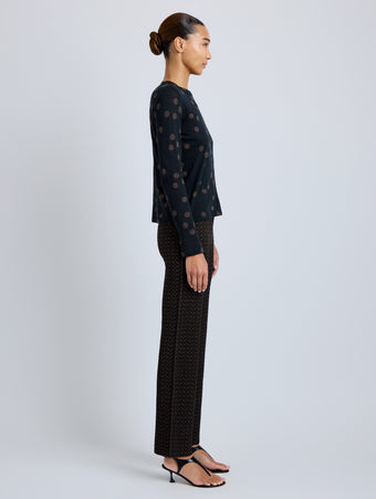 Proenza Schouler Side full length image of model wearing Mia Top in Polka Dot Jersey in Black Multi