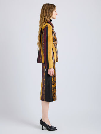 Proenza Schouler Side full length image of model wearing Sirine Skirt in Pieced Leather in Gold Multi