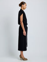 Proenza Schouler Side full length image of model wearing Carine Cargo Skirt in Matte Double Crepe in Black