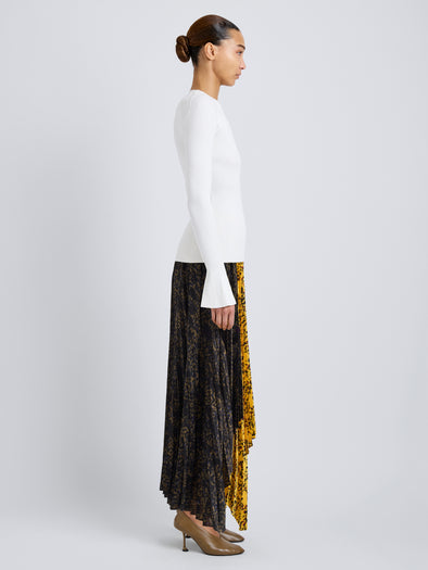 Proenza Schouler Side full length image of model wearing Paulina Dress in Pleated Georgette in Gold Multi