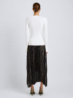Proenza Schouler Back full length image of model wearing Paulina Dress in Pleated Georgette in Gold Multi
