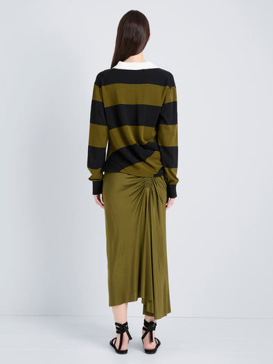 Proenza Schouler Back full length image of model wearing Naia Skirt in Viscose Satin Jersey in Moss