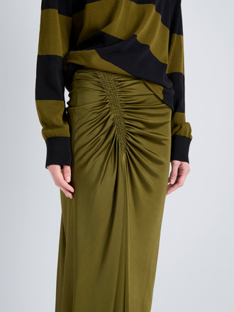 Proenza Schouler Detail image of model wearing Naia Skirt in Viscose Satin Jersey in Moss