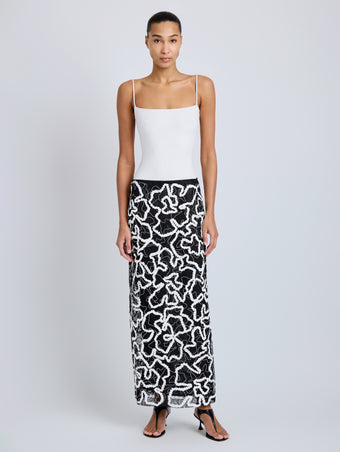Proenza Schouler Front full length image of model wearing Maite Skirt in Sequin Embroidery Lace in White Multi