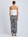 Proenza Schouler Back full length image of model wearing Maite Skirt in Sequin Embroidery Lace in White Multi