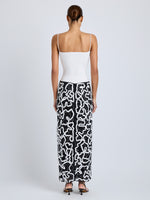 Proenza Schouler Back full length image of model wearing Maite Skirt in Sequin Embroidery Lace in White Multi
