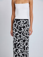 Proenza Schouler Detail image of model wearing Maite Skirt in Sequin Embroidery Lace in White Multi