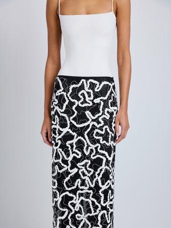 Proenza Schouler Detail image of model wearing Maite Skirt in Sequin Embroidery Lace in White Multi