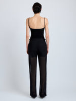 Proenza Schouler Back full length image of model wearing Eran Pant in Sheer Wool in Black