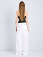 Proenza Schouler Back full length image of model wearing Lissia Pant in Classic Cotton Shirting in Optic White