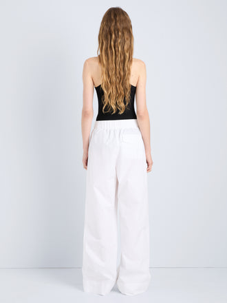 Proenza Schouler Back full length image of model wearing Lissia Pant in Classic Cotton Shirting in Optic White