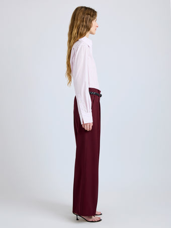 Proenza Schouler Side full length image of model wearing Halima Pant in Wool Gabardine in Oxblood