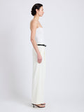 Proenza Schouler Side full length image of model wearing Halima Pant in Matte Double Crepe in Alabaster