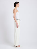 Proenza Schouler Side full length image of model wearing Halima Pant in Matte Double Crepe in Alabaster